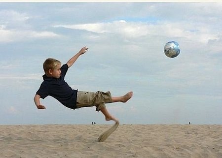 kid playing with ball